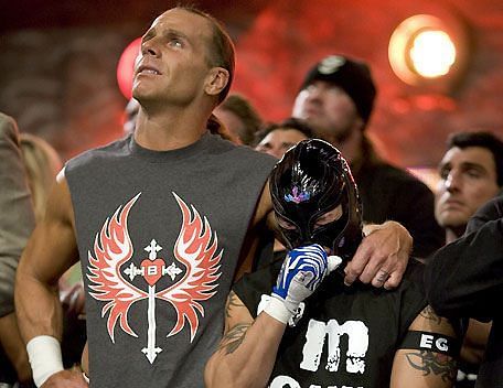 Shawn Michaels and Rey Mysterio paying tribute to Eddie Guerrero.